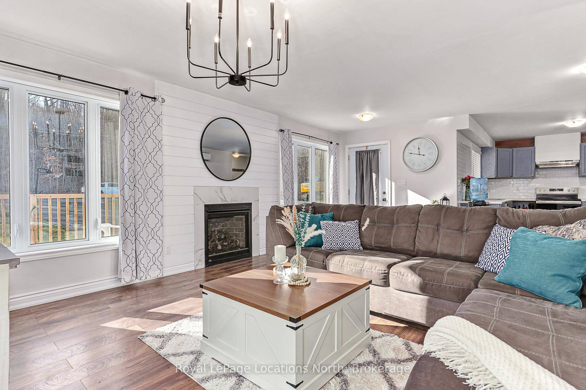 Beautifully crafted BUNGALOW, located just a short drive from Lora Bay, Thornbury, and Meaford, offering the perfect blend of modern efficiency and comfortable main floor living.