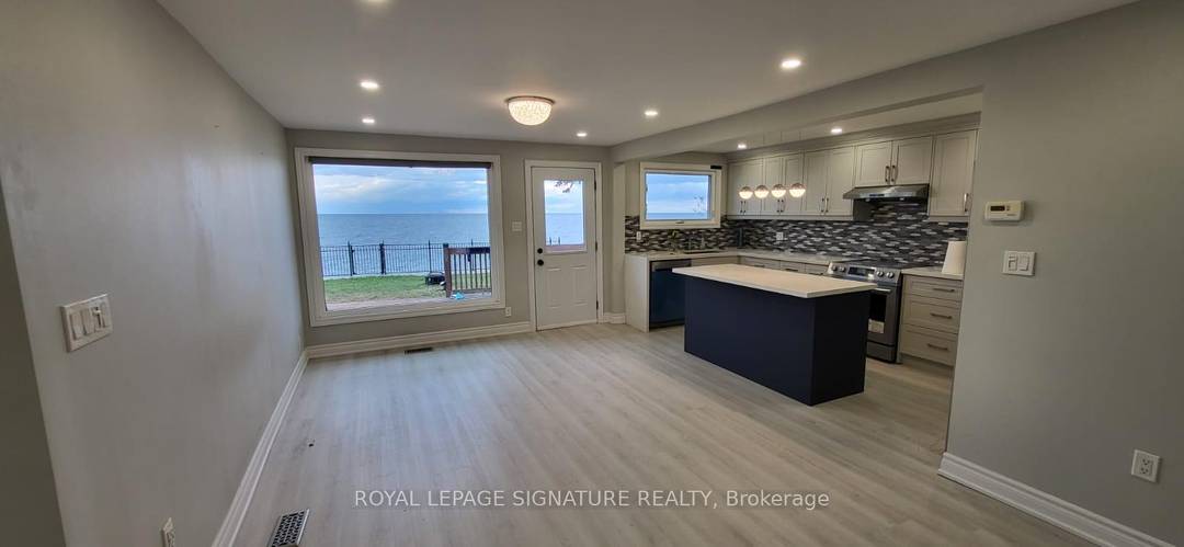 Discover elevated coastal living in this fully furnished, beautifully curated residence, perfectly situated in one of Stoney Creek's most exclusive lakeside neighborhoods.