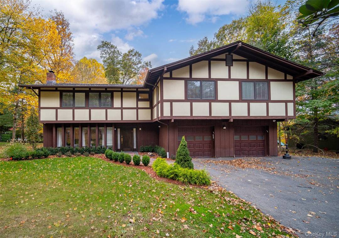 WOW ! Move right in ! Beautiful Tudor split level colonial updated with great taste.