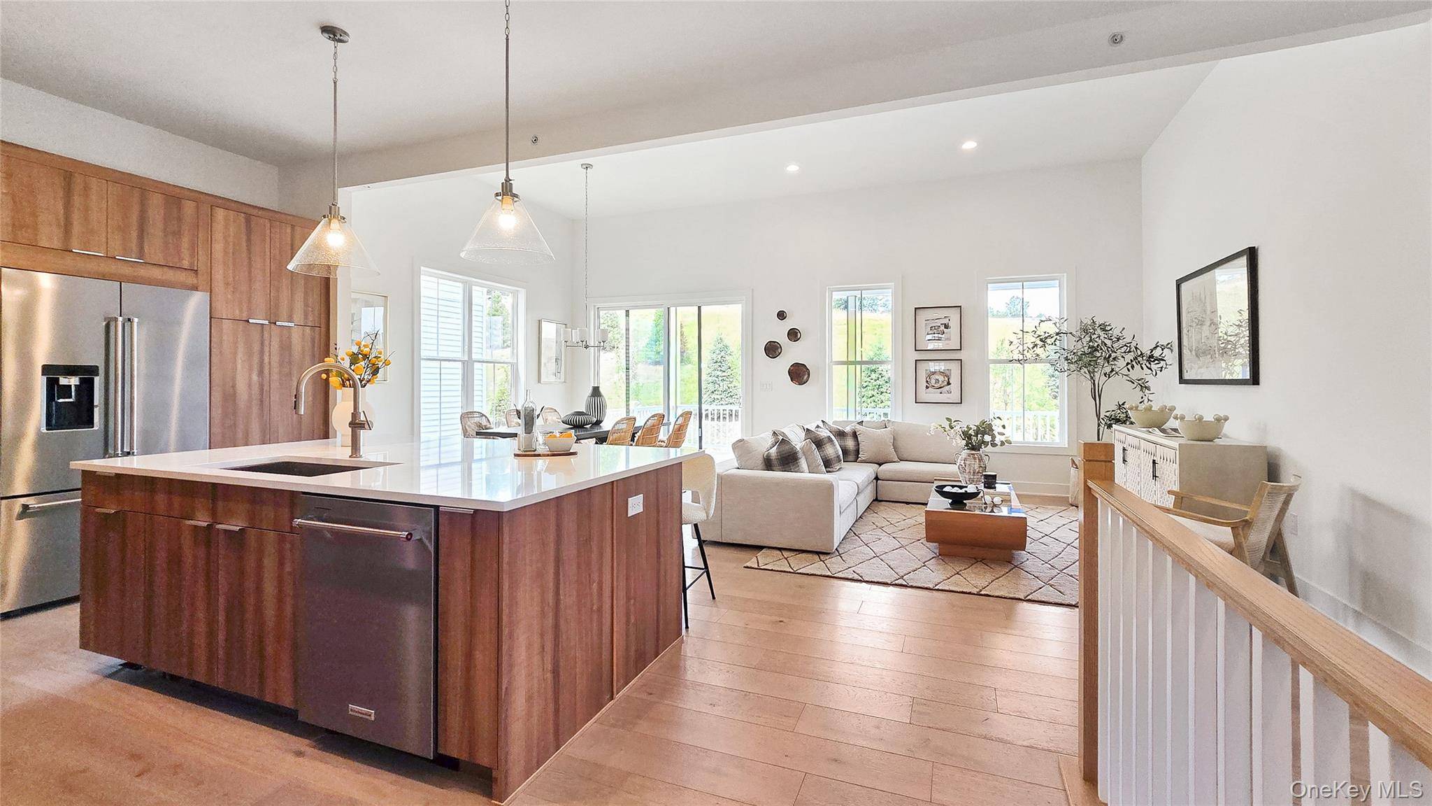 Overlooking the great room and accompanied by a casual dining area, the gorgeous kitchen is the perfect environment for entertaining guests with wraparound counter space and a sprawling central island.