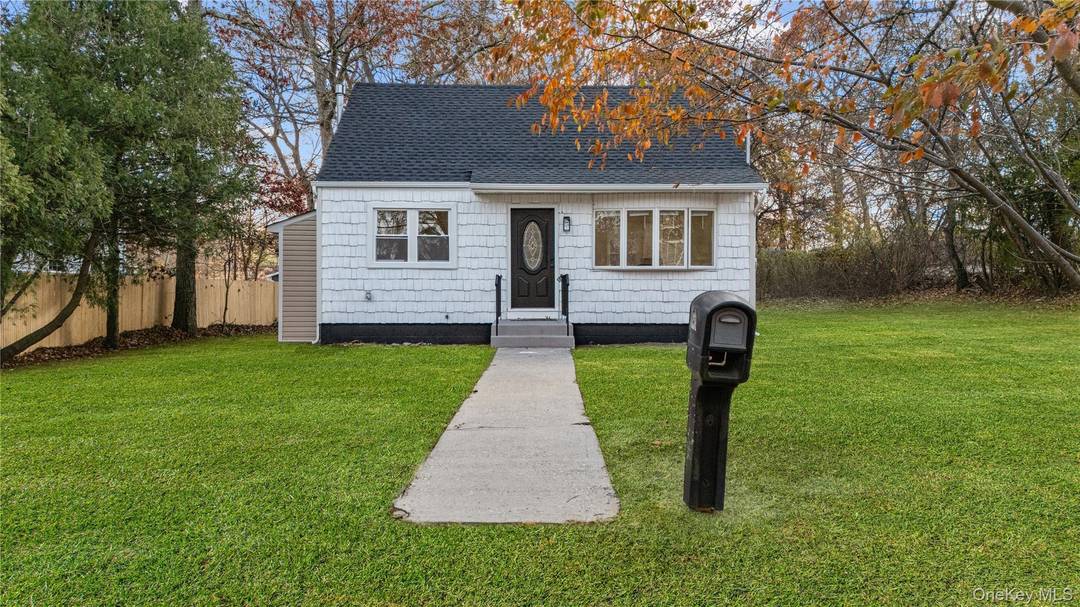 Welcome to 78 Carr Lane a charming 4 bedroom cape cod nestled on a spacious third acre lot in Coram.