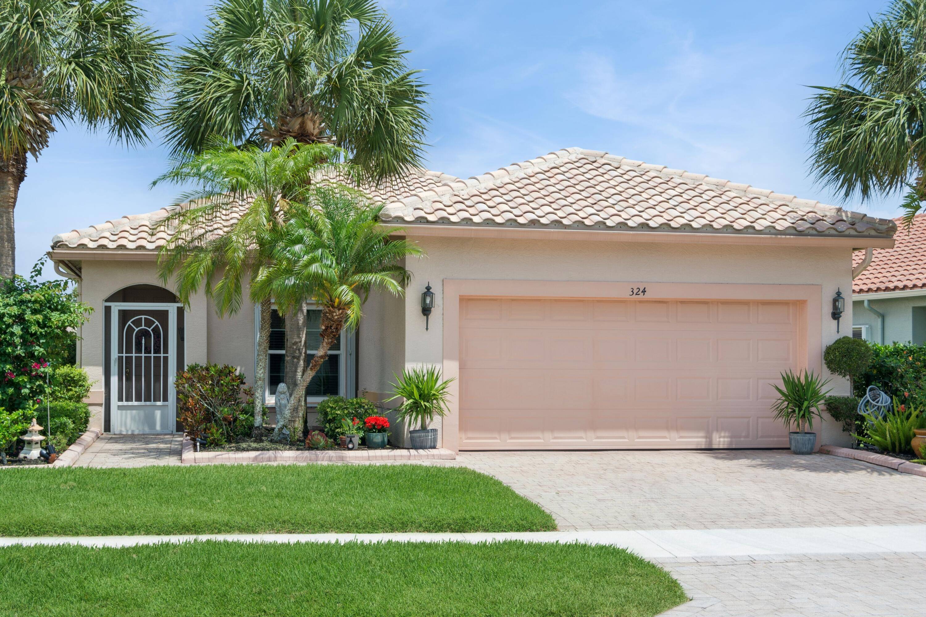 Lovely 2 bedroom 2 bath lakefront home shows pride of ownership in every detail.