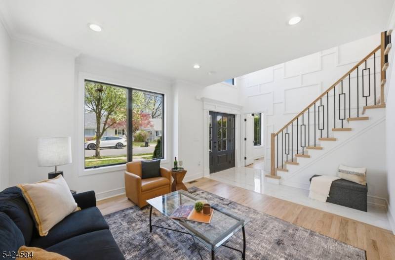 Experience modern living in this newly constructed home built over a solid existing foundation, blending fresh design with enduring quality.