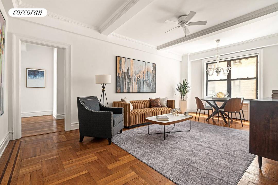 This beautifully renovated home exhibits the grandeur of oversized rooms with high ceilings in a classic pre war, full service building designed by famed architect Rosario Candela.