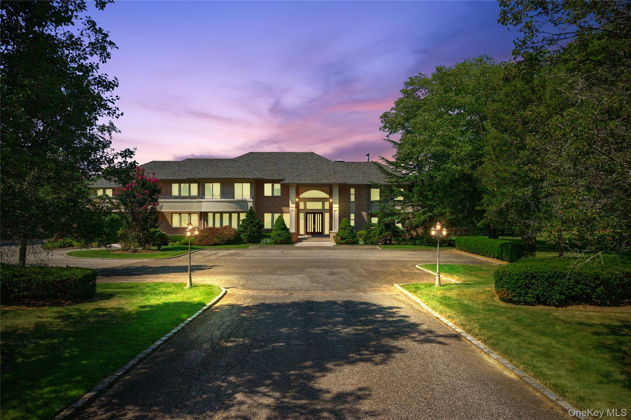 Set along a picturesque, tree lined street, this stately brick colonial offers over 10, 000 square feet of refined living space, gracefully situated on more than four acres of impeccably ...