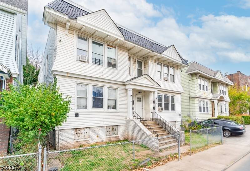 Large 4 family live in one and rent the other units.