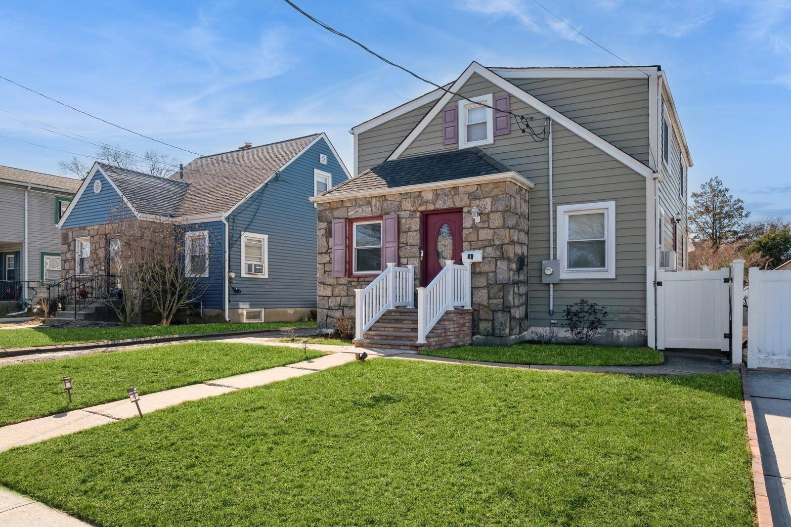 This Beautiful home that offers both comfort and functionality of a front door, back sliding door, side door and a basement outside entrance.