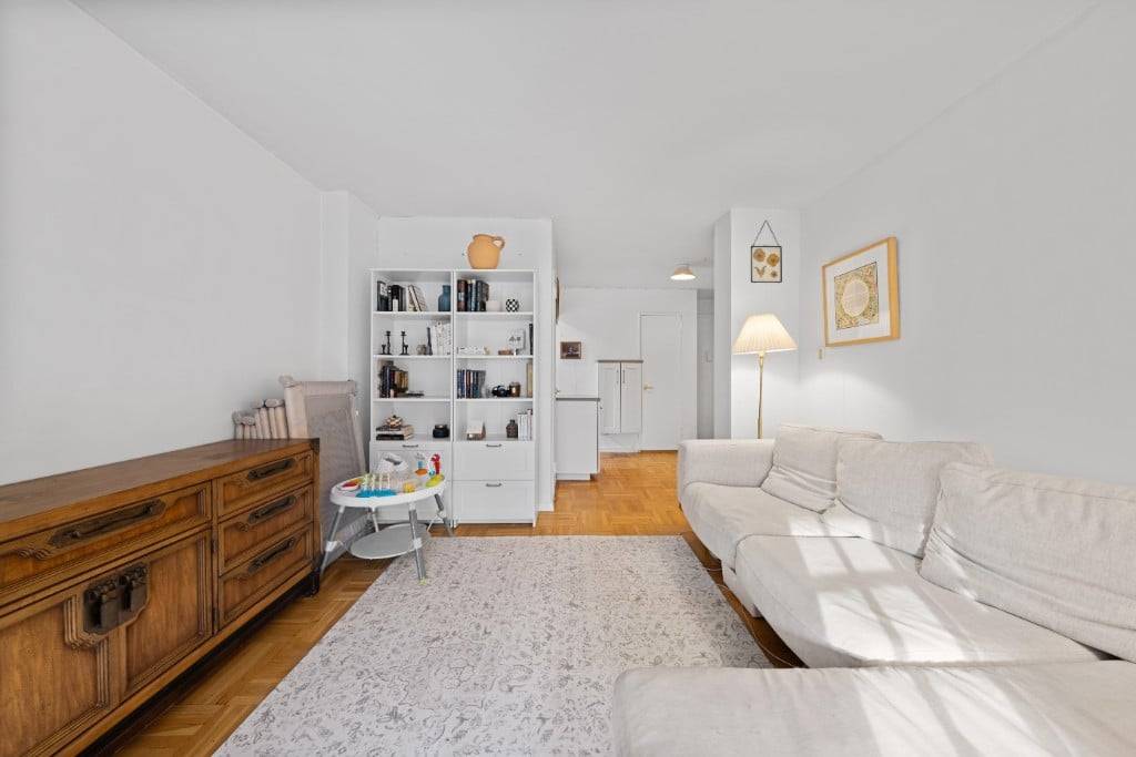 WELCOME HOME ! ! ! ! ! This stunning corner one bedroom unit offers both southern and western exposures, flooding the home with natural light throughout the day.