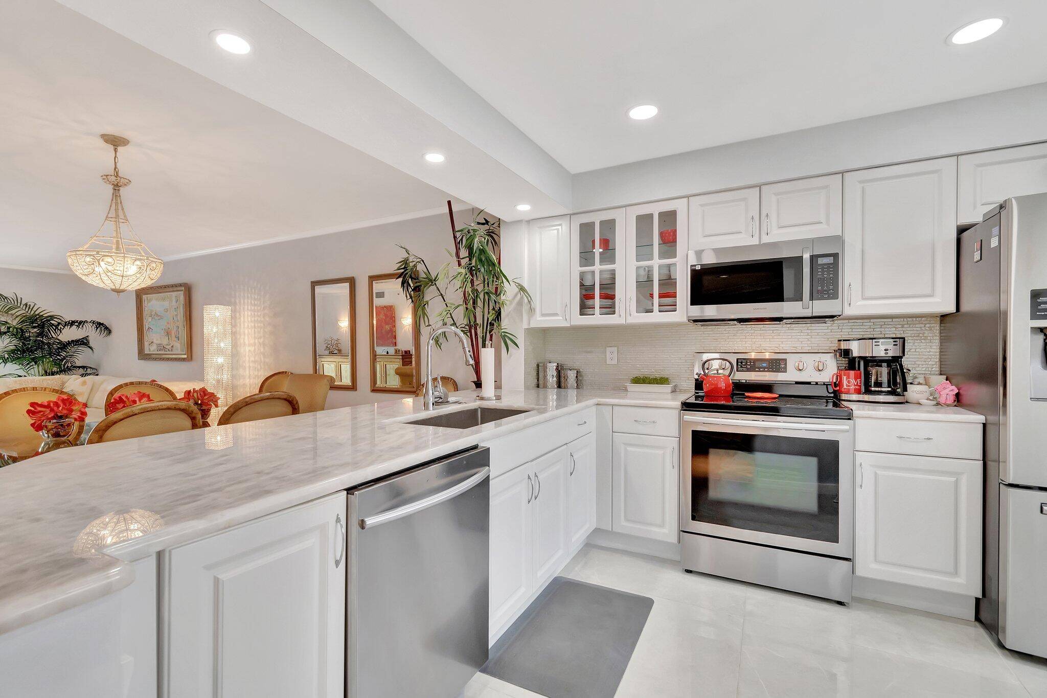 Introducing 5778 Crystal Shores Drive, Unit 206, within the dynamic Coral Lakes community located in the picturesque surroundings of Boynton Beach, Florida.