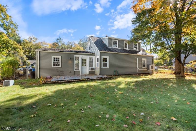 Classic and Charming Cape Cod home, beautifully blending vintage charm with modern comfort.
