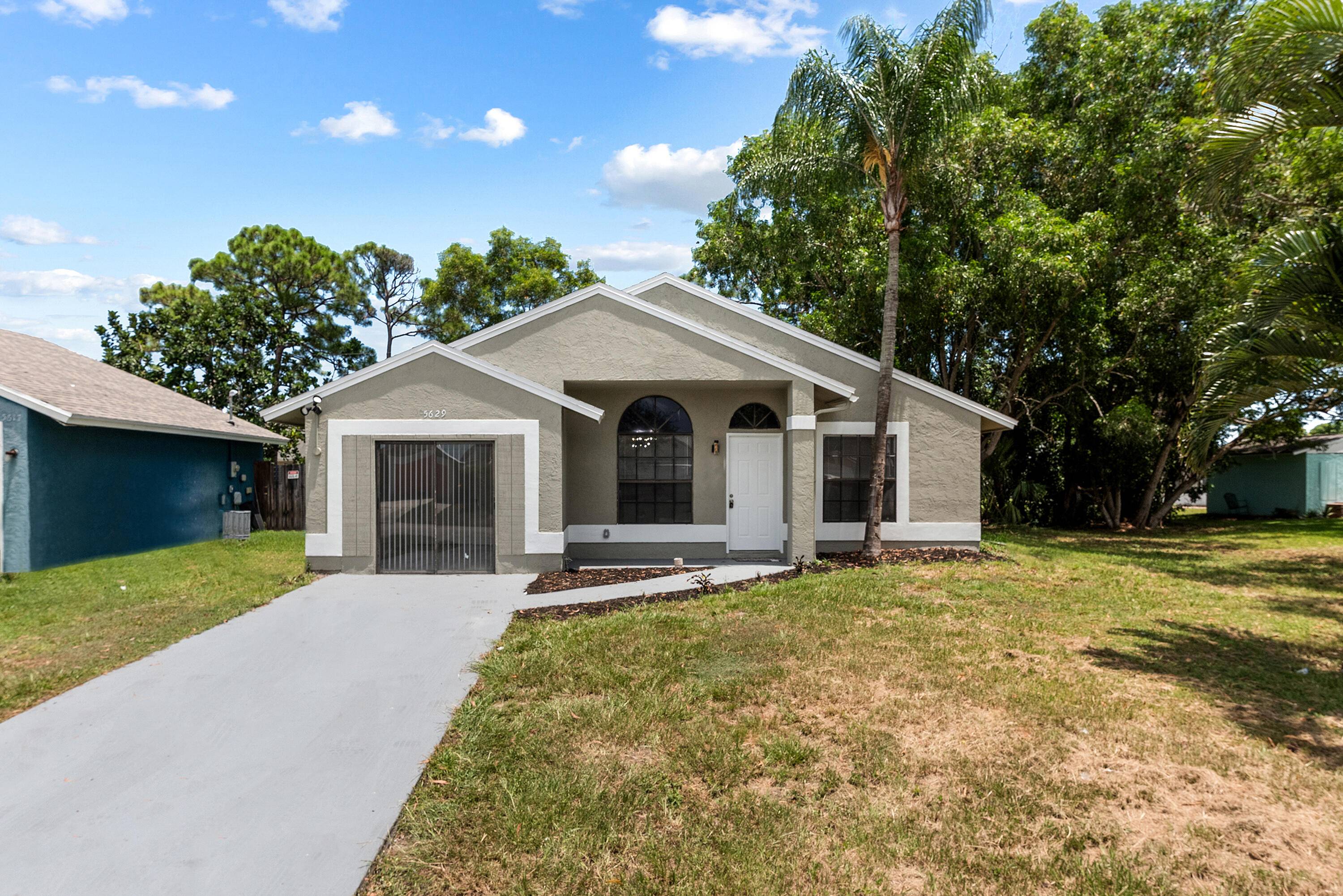 Welcome to this beautifully updated 3 bedroom, 2 bathroom home featuring a brand new roof 2025 and brand new vinyl flooring throughout.