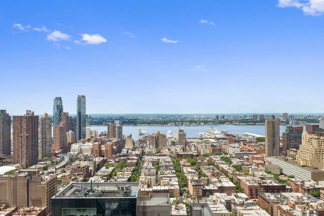 This stunning, spacious, and fully furnished 2 bedroom, 2.