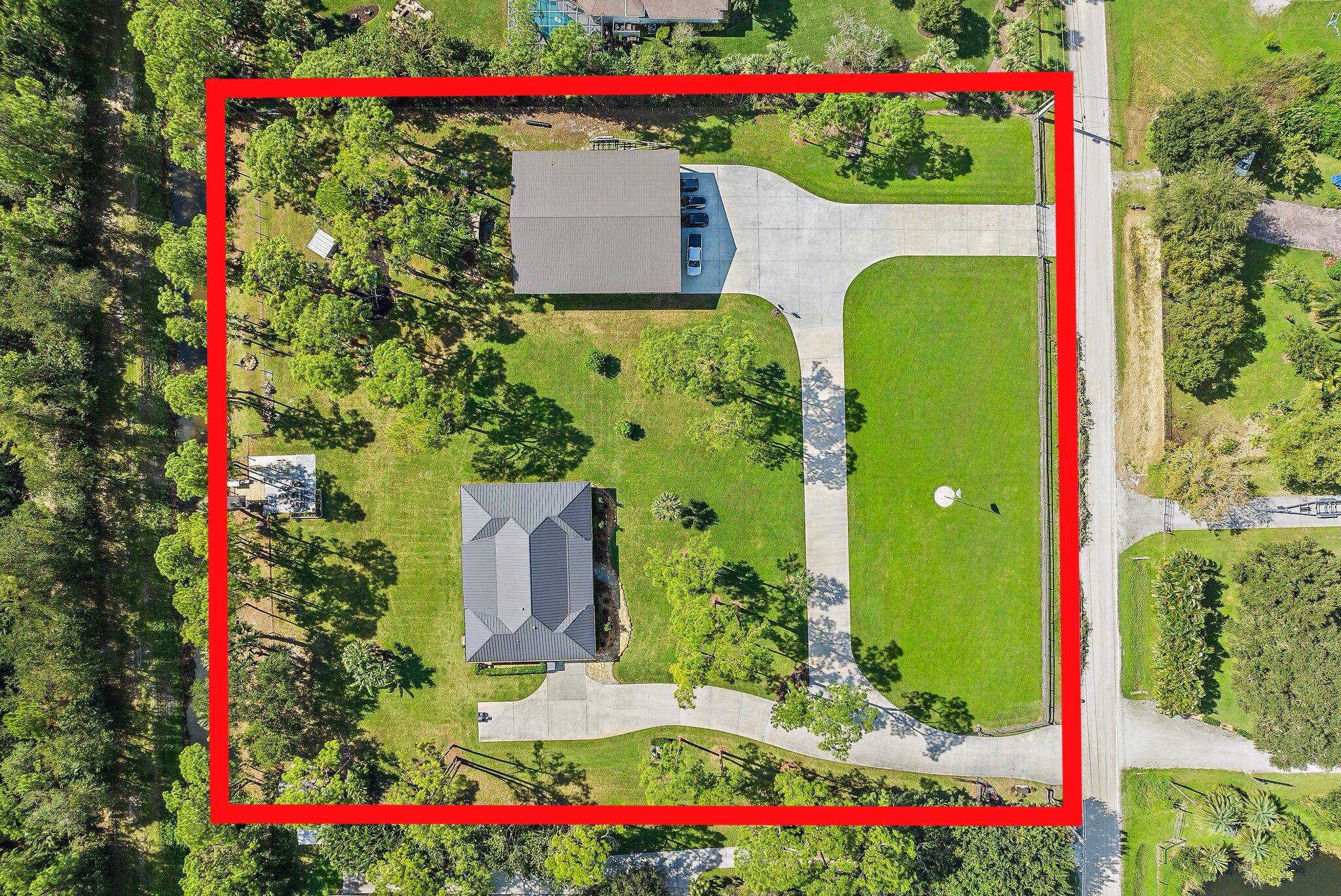 Welcome to this extraordinary 2021 built estate, set on a sprawling 3 acre oasis in desirable Jupiter Farms.