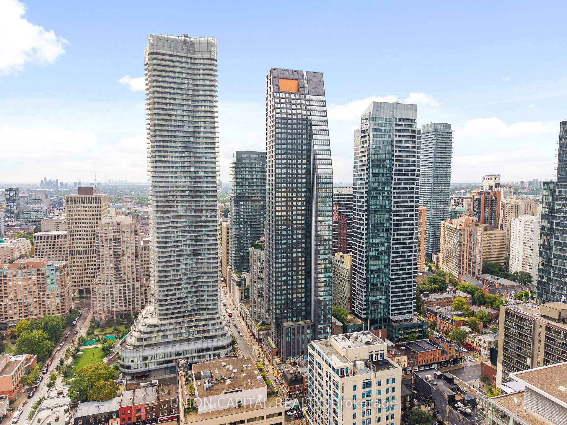 Welcome to 8 Wellesley Lower Penthouse Living with Iconic Toronto Views.