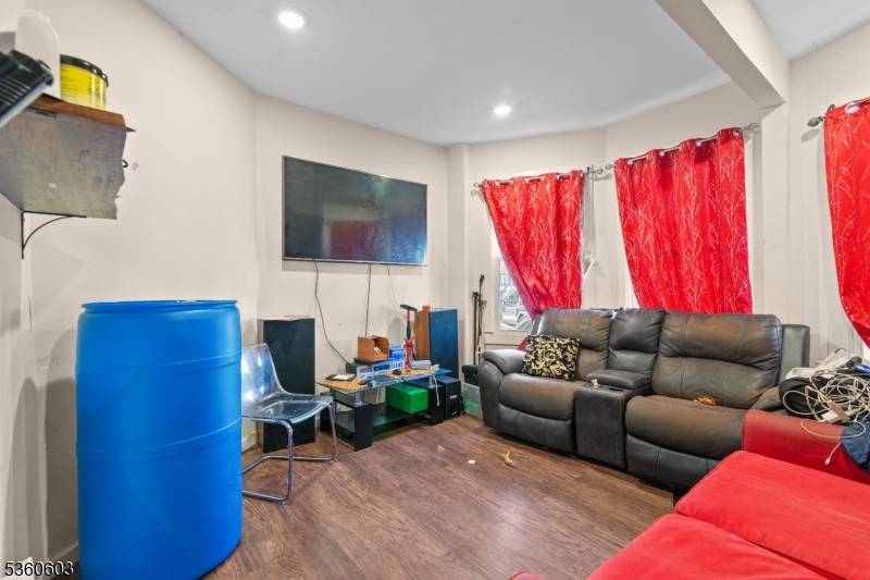 Multi family home with 6 bedrooms 2baths, parking and a full finished basement and separate utilities.