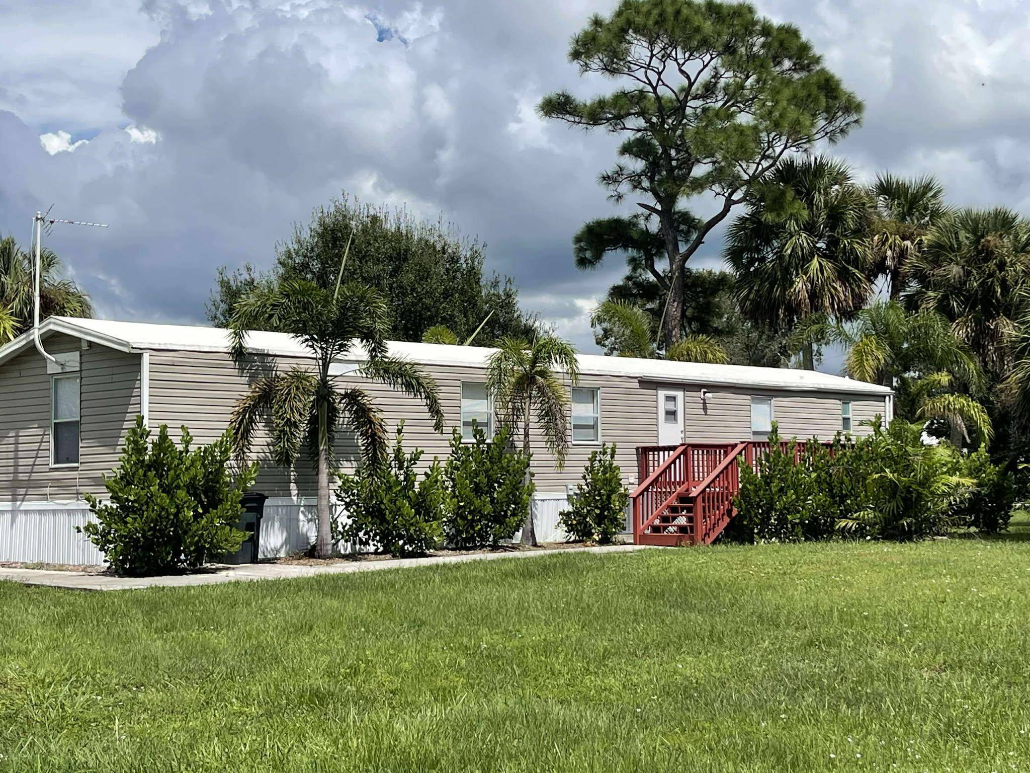 This gorgeous 2 bedroom, 2 bath split floor plan manufactured home on half an acre has been totally renovated and is move in ready.