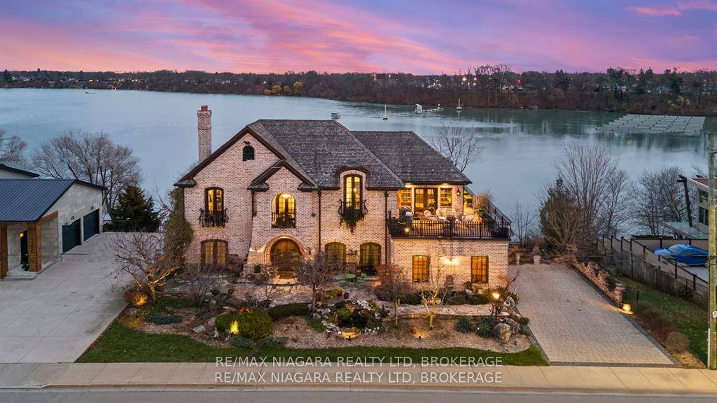 Pristine waterfront living meets timeless European elegance.