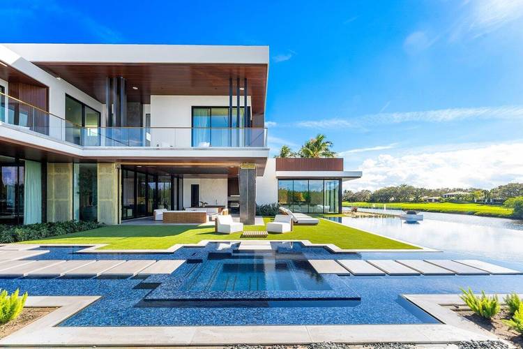 Step into unparalleled luxury in this brand new custom estate located in the prestigious guard gated community of Admirals Cove.