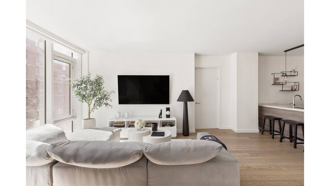 Welcome to Residence 4H, a beautifully designed two bedroom, two bathroom home in the heart of Hell's Kitchen.