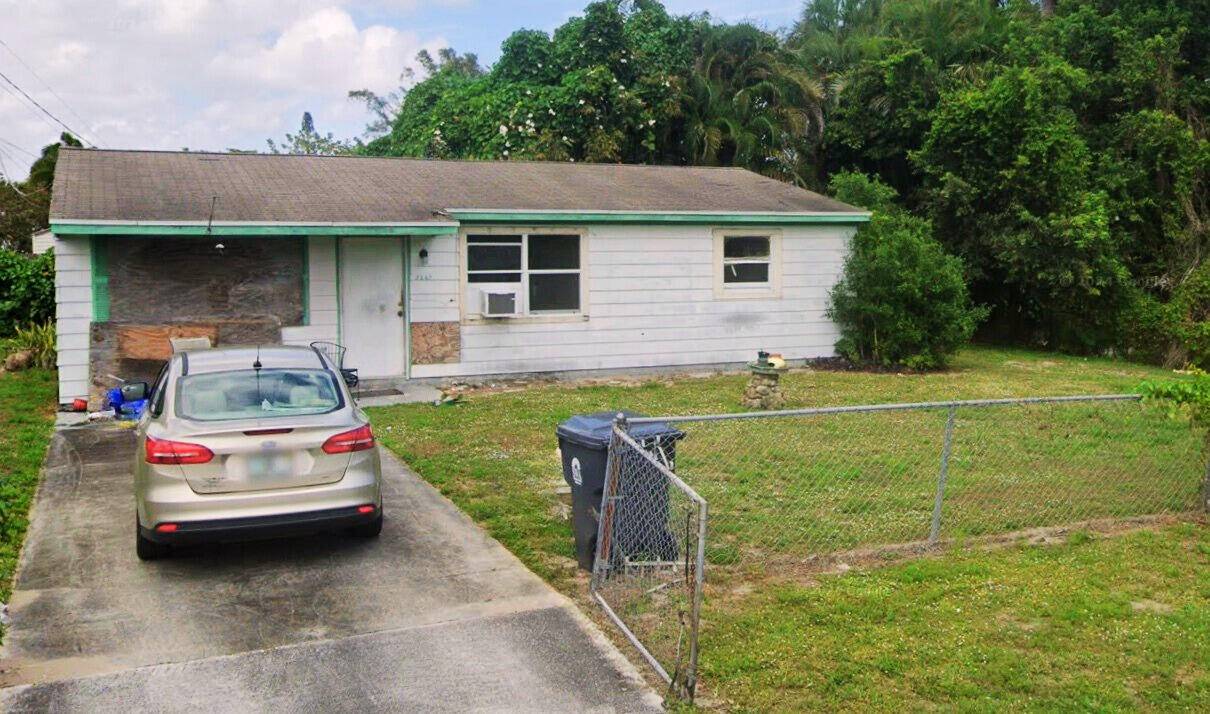 Canal Front Opportunity with Lake Osbourne Access !