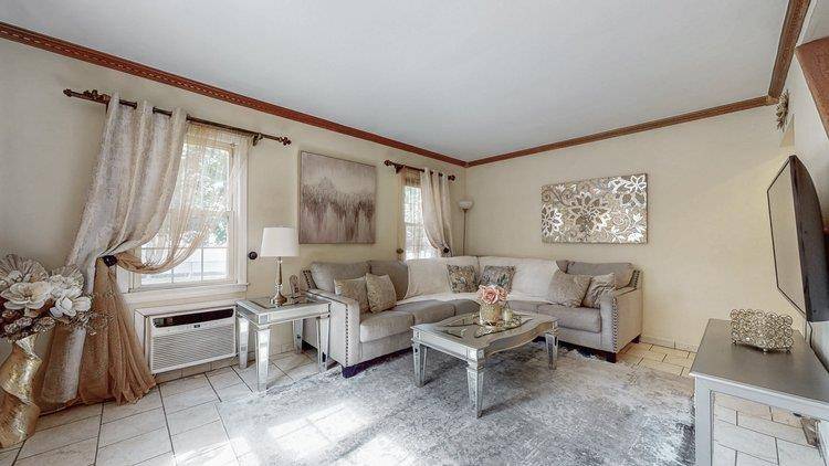 Welcome to this beautifully maintained Cape style home situated on a spacious 40x100 corner lot in the heart of Auburndale, Flushing.