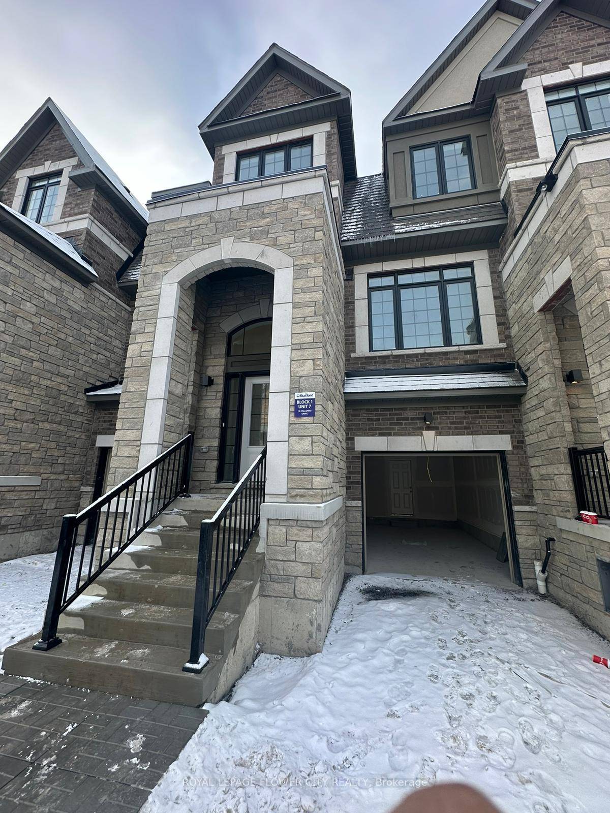 Absolutely stunning ! This newly constructed, pristine 3 level townhouse boasts a modern design and has never been occupied.