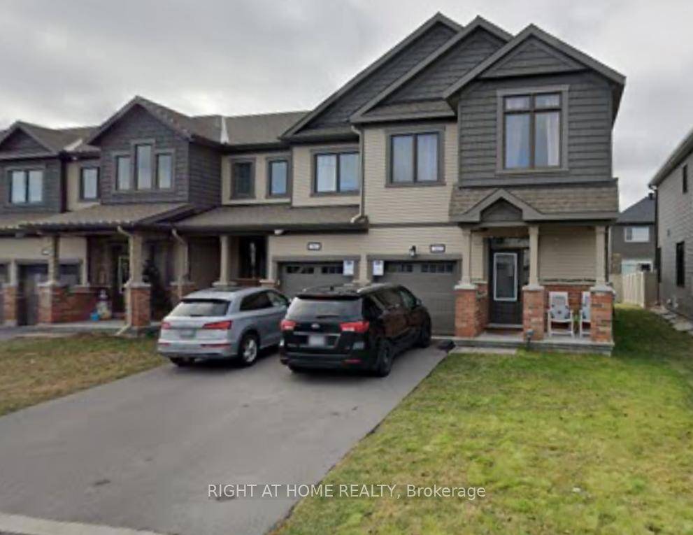 This beautifully maintained three bedroom, three bathroom end unit, built in 2020 in Blackstone South, offers a spacious layout with a bedroom level, laundry room, and attached garage with parking.