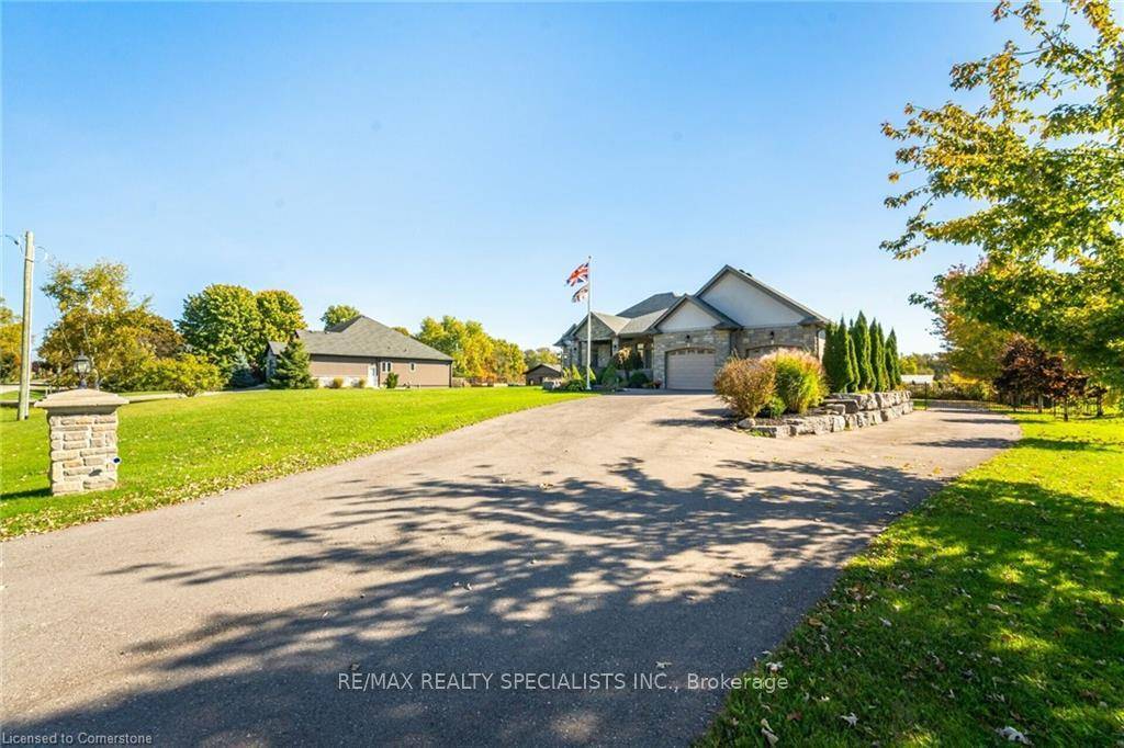 Escape to peaceful country living just minutes from Highways 403 and 401 !