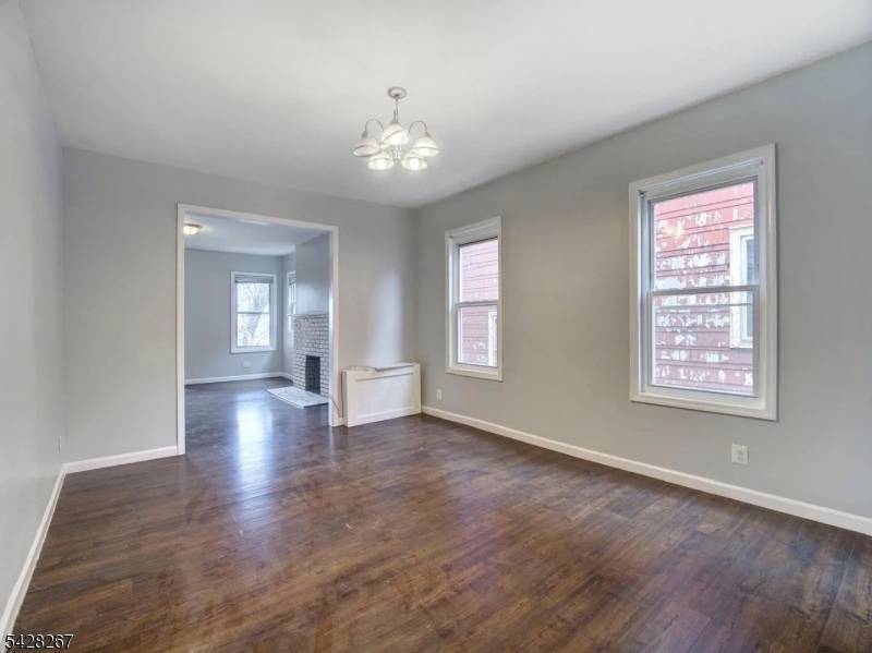 Welcome to this beautifully renovated multi family home that truly feels like new.