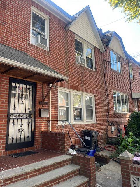 Legal 2 Family Brick Home in the Heart of Middle Village.