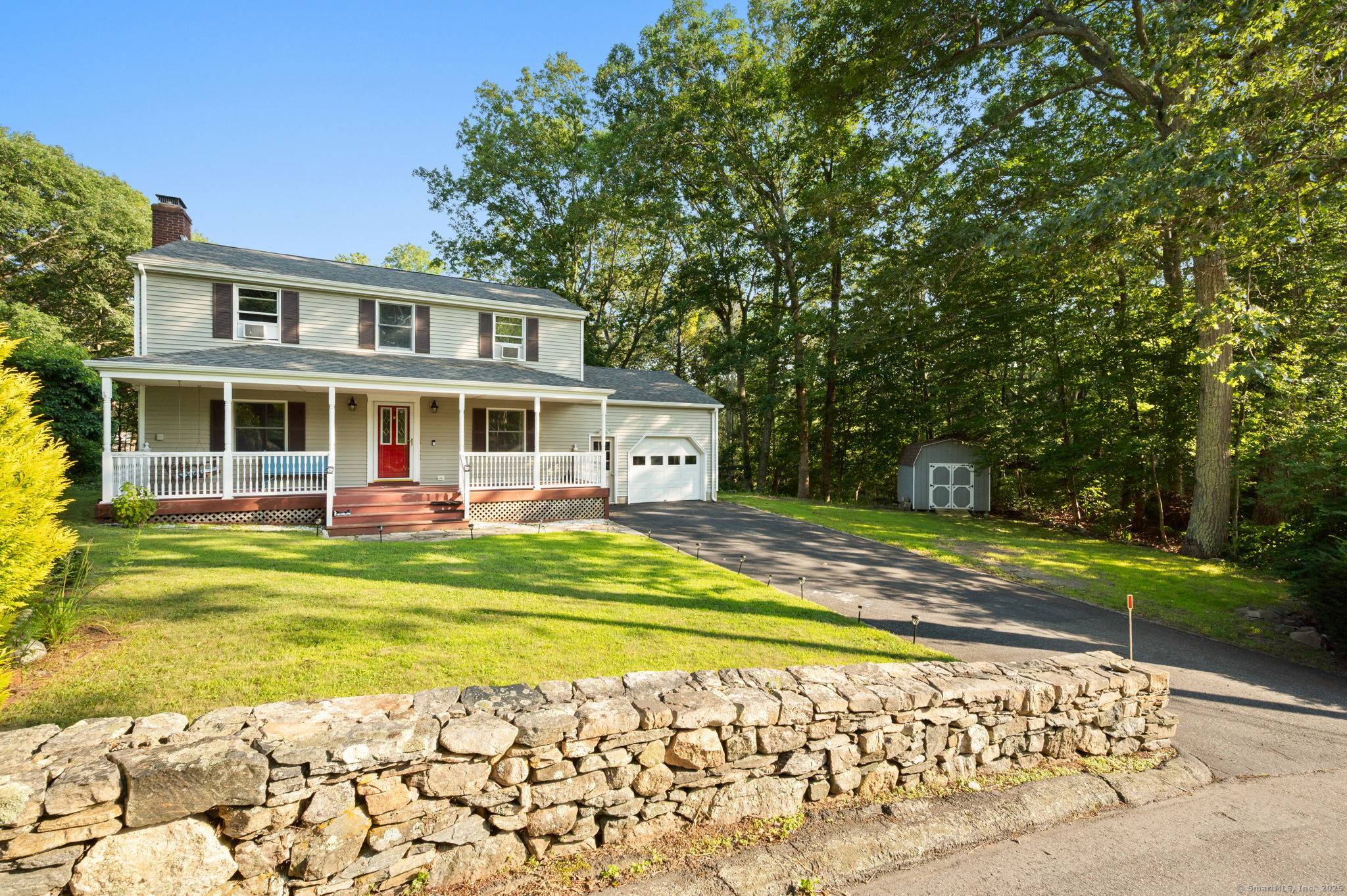 Welcome to this well maintained Colonial set on a private 1.