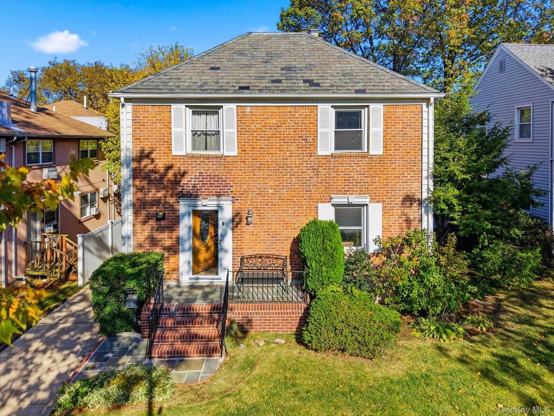Welcome home to this charming brick side hall Colonial in the Hillcrest section of Queens.