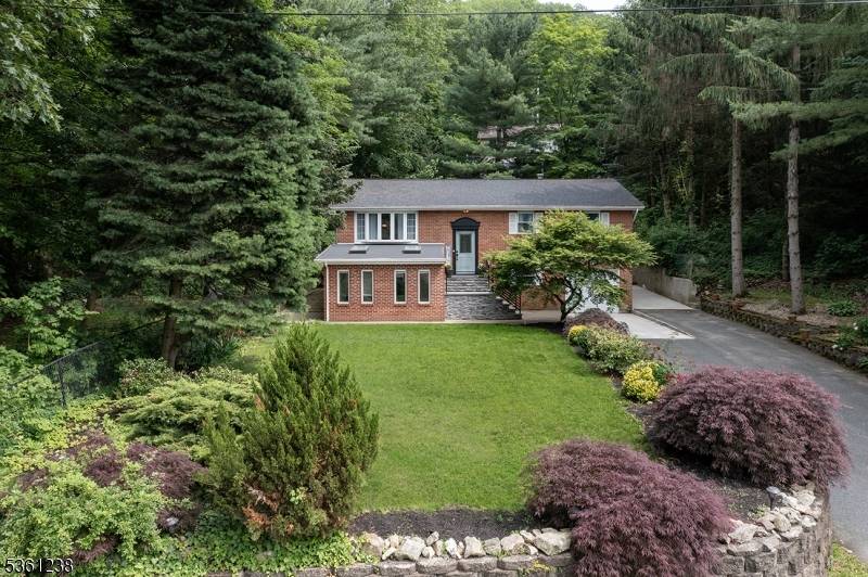 Spacious 5 Bedroom, 2 Bathroom Brick Home with Year Round Lake ViewsNestled in a serene lakeside community, this beautifully updated brick home offers 5 generous bedrooms and 2 full bathrooms.