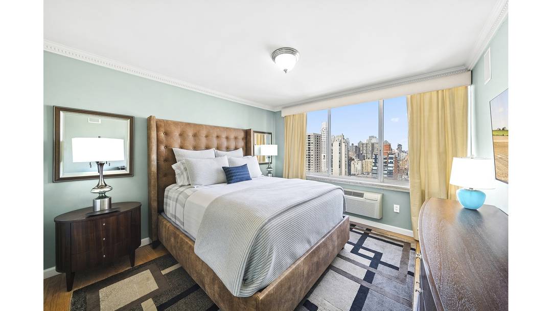 Welcome to Residence 28D at The Fontaine a high floor one bedroom with sweeping city views and exceptional light in the heart of the Upper East Side.