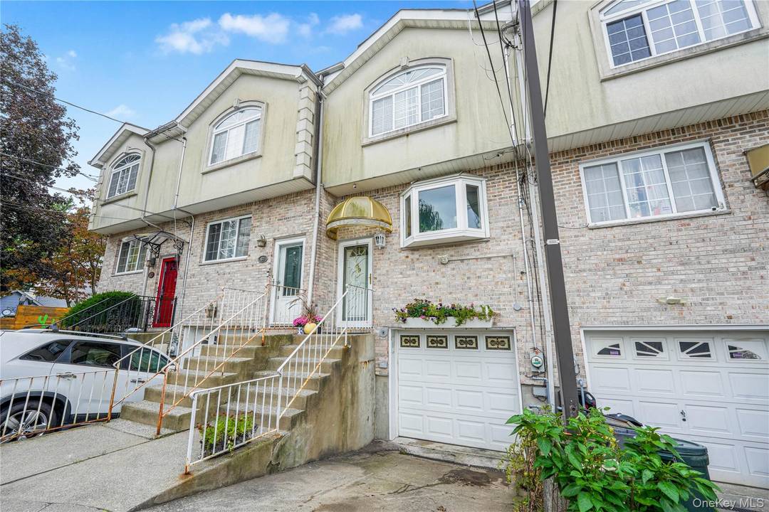 Welcome Home ! Discover this beautifully renovated townhouse nestled in the heart of Richmond, Staten Island.