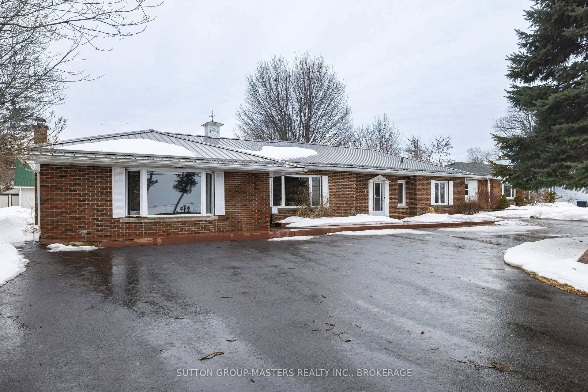 Welcome home ! This simply amazing and one of a kind waterfront property with stunning views of Lake Ontario awaits a new owner to call it home.