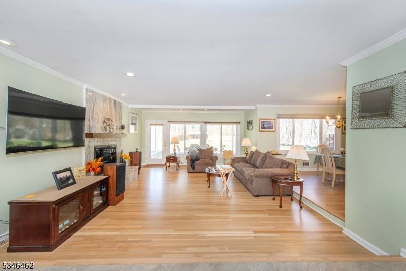 Nestled in the highly desirable Montville area, this immaculate custom built ranch offers the ease of one floor living on a sprawling 0.