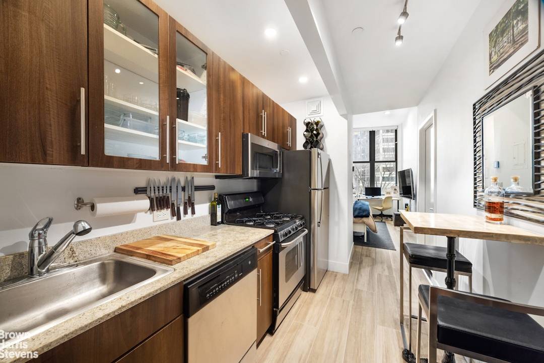 The open layout is complemented by an east facing exposure with corridor views to the water, bringing in natural light and a sense of openness.