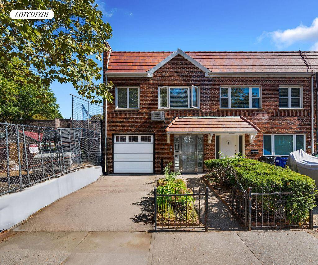 Beautifully maintained two family brick home offering parking, balcony, garage, and a private backyard.
