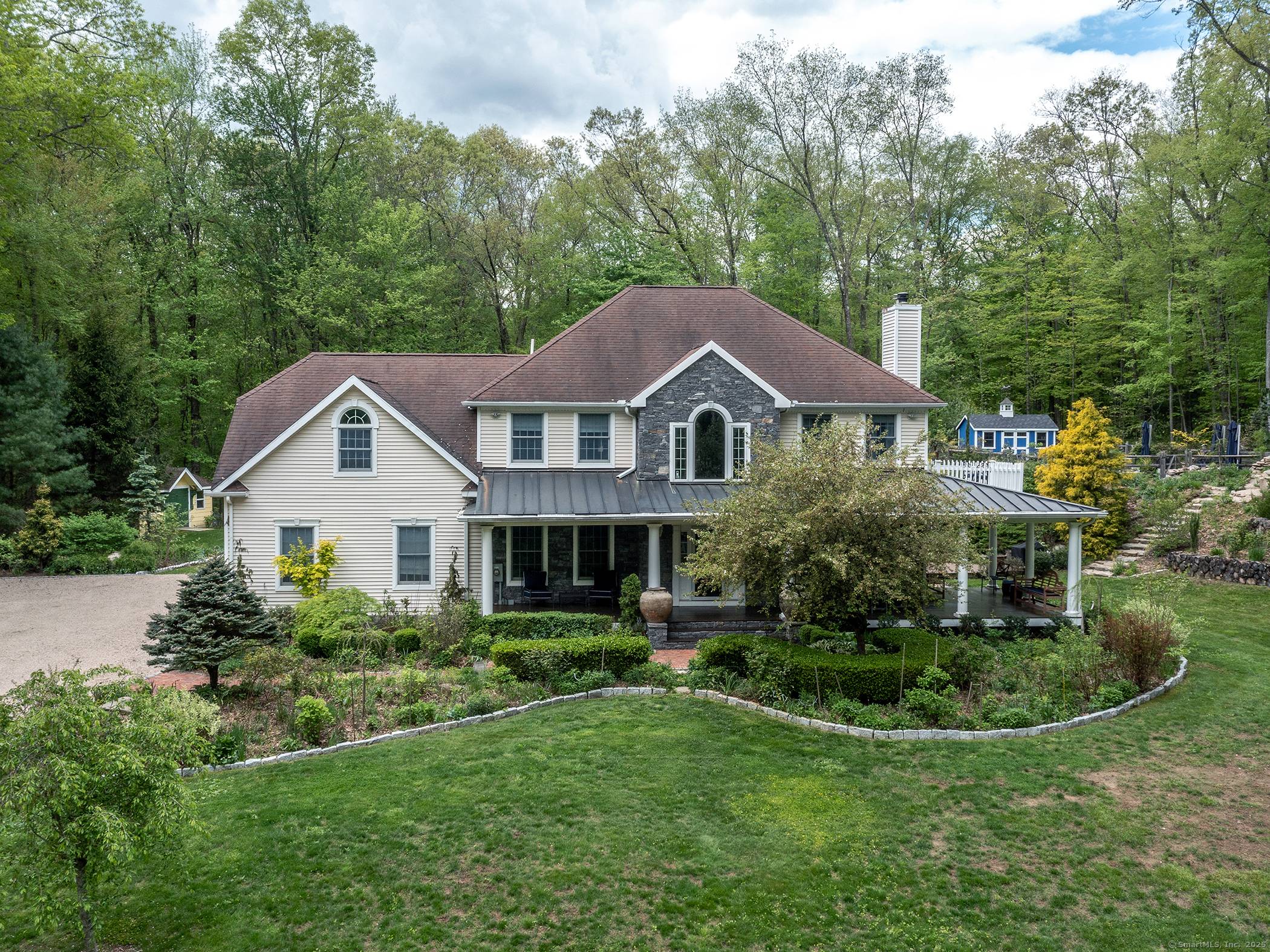 Fantastic Colonial in Roxbury down long private drive featuring low maintenance salt water spa pooL.