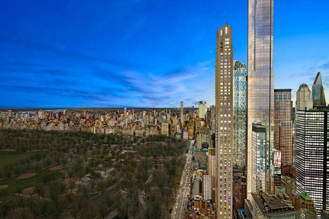 This dramatic transitional floor apartment is located high above Central Park on the 75th floor at 25 Columbus Circle.