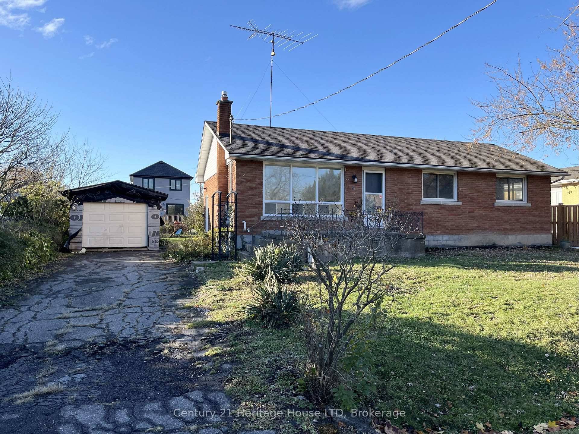 All brick 3 Bedroom bungalow on a large 70 x 104 Ft lot in a great location on a quiet street, just steps to 12 Mile Creek, trails, schools and ...