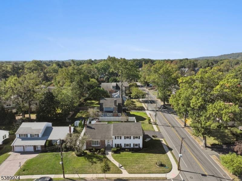 Welcome to 61 Country Club Lane, a spacious split level home offering six bedrooms, three full bathrooms, and over 2, 700 square feet of flexible living space.