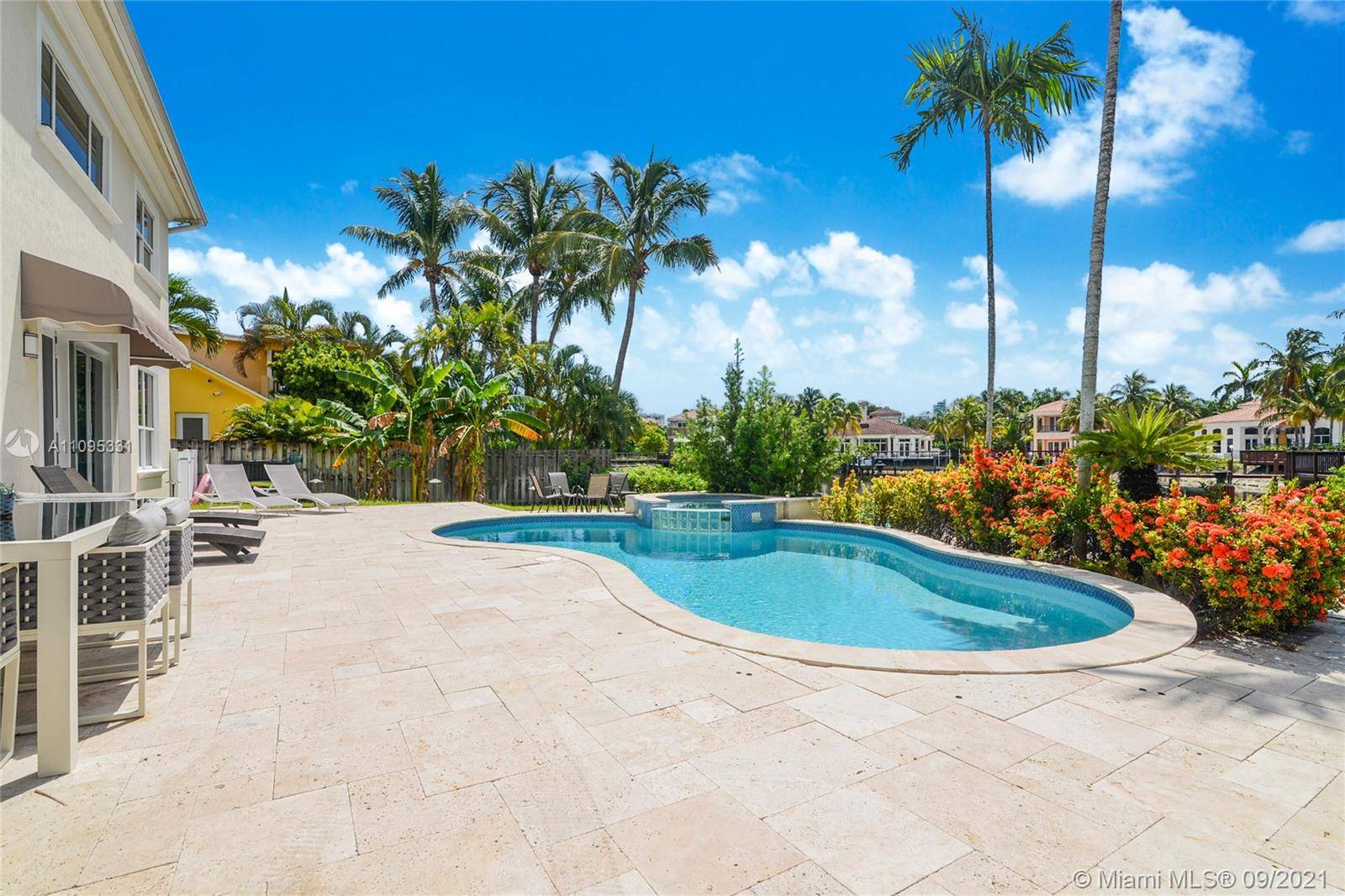 Enjoy Hollywood waterfront living in this gorgeous, fully furnished mansion with renovated contemporary finishes and double height ceilings.