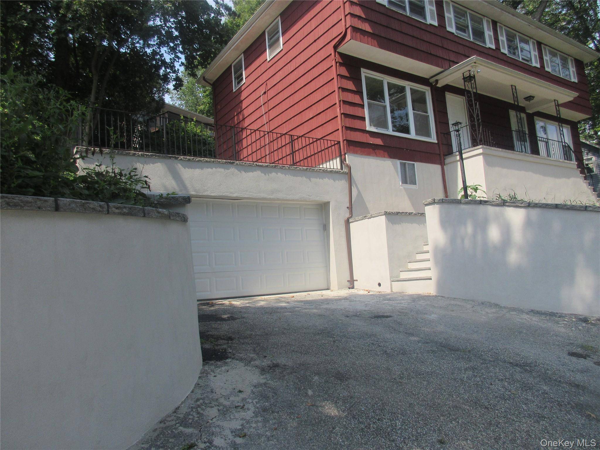 Renovated duplex plus full finished basement, seasonal Hudson River views.