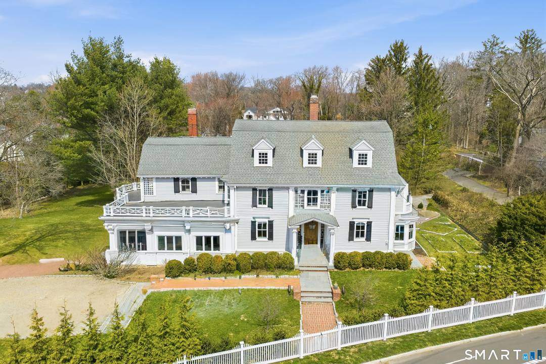 Step into a rare offering that captures the essence of classic New England living a stately 1880s residence set in one of the Gold Coast's most desirable towns.