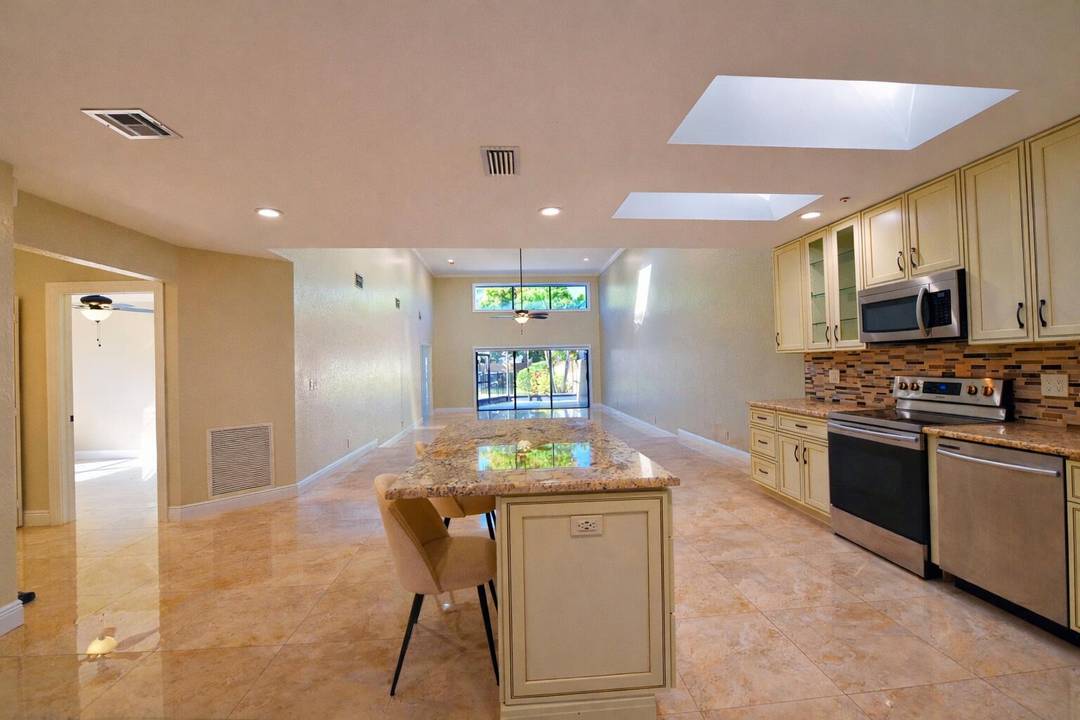 Dream corner home in Boca Raton located in a desirable gated community !