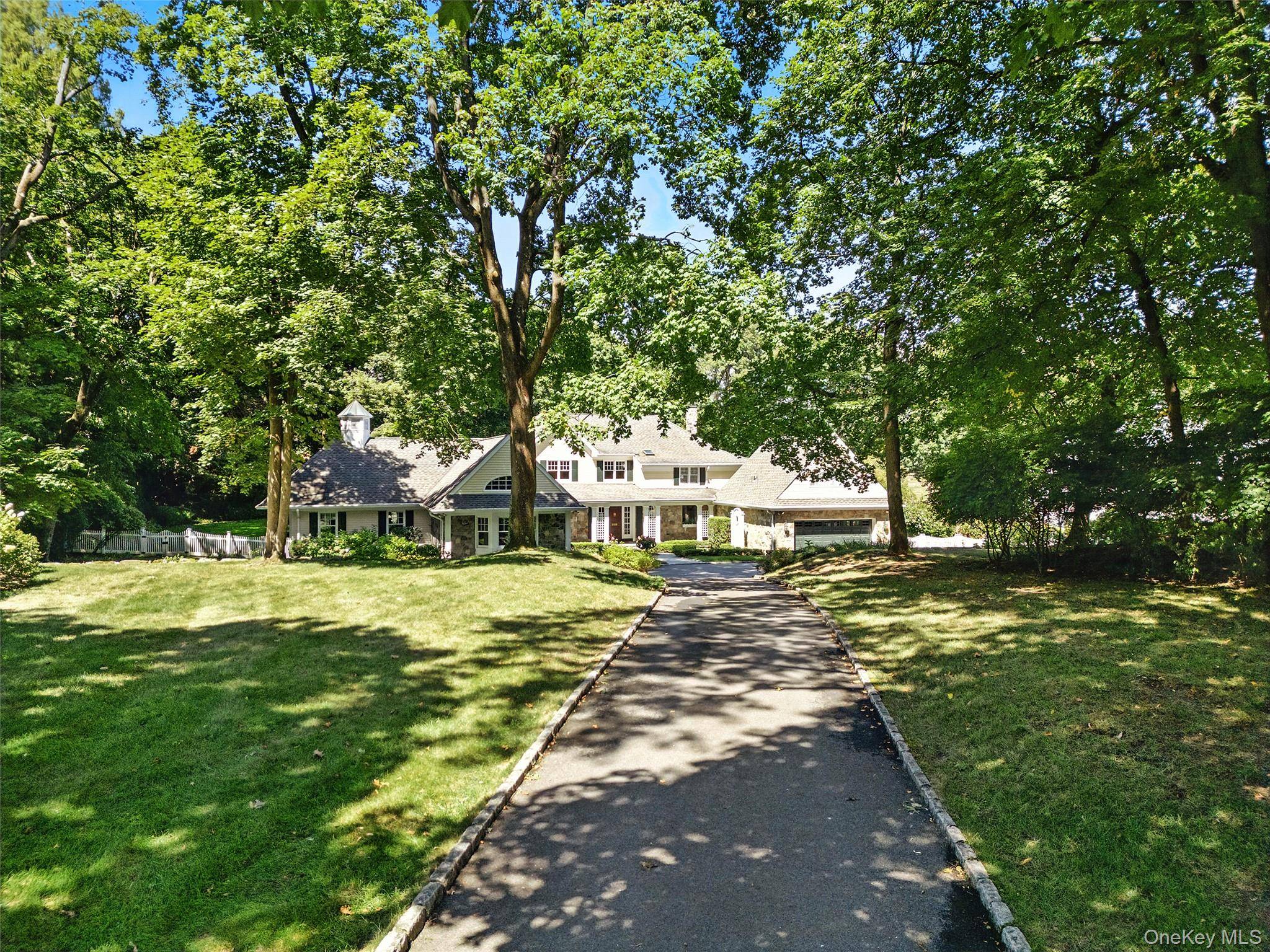 Perfectly situated just minutes from the Harrison train and downtown Rye, this gracious Colonial is nestled at the end of a private drive on over an acre of beautifully landscaped ...