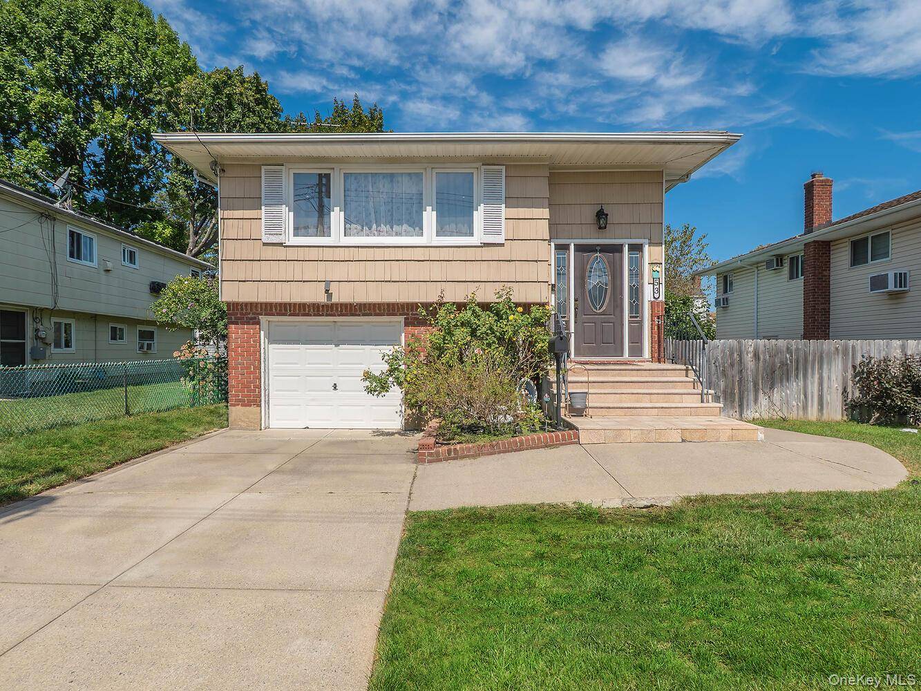 Spacious And Bright Raised Ranch Nestled In The Heart Of Roslyn.