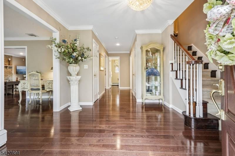 Located in the sought after Randolph Chase community, 5 Revere Ct presents an exceptional opportunity to own a home that blends classic design with everyday functionality on a flat, level ...